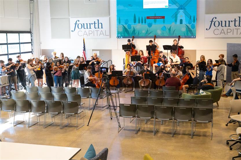 Students play in orchestra